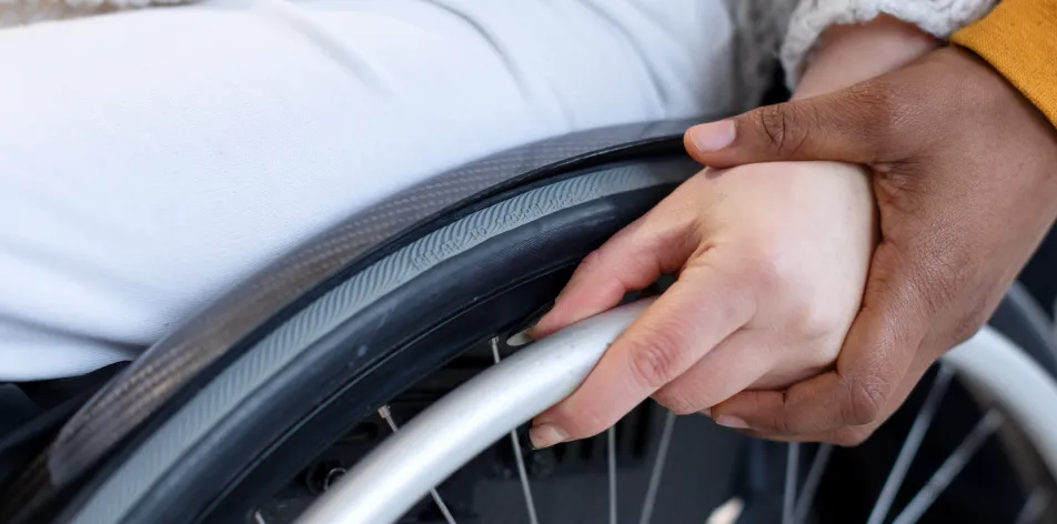 Close-up of supportive care and accessibility assistance