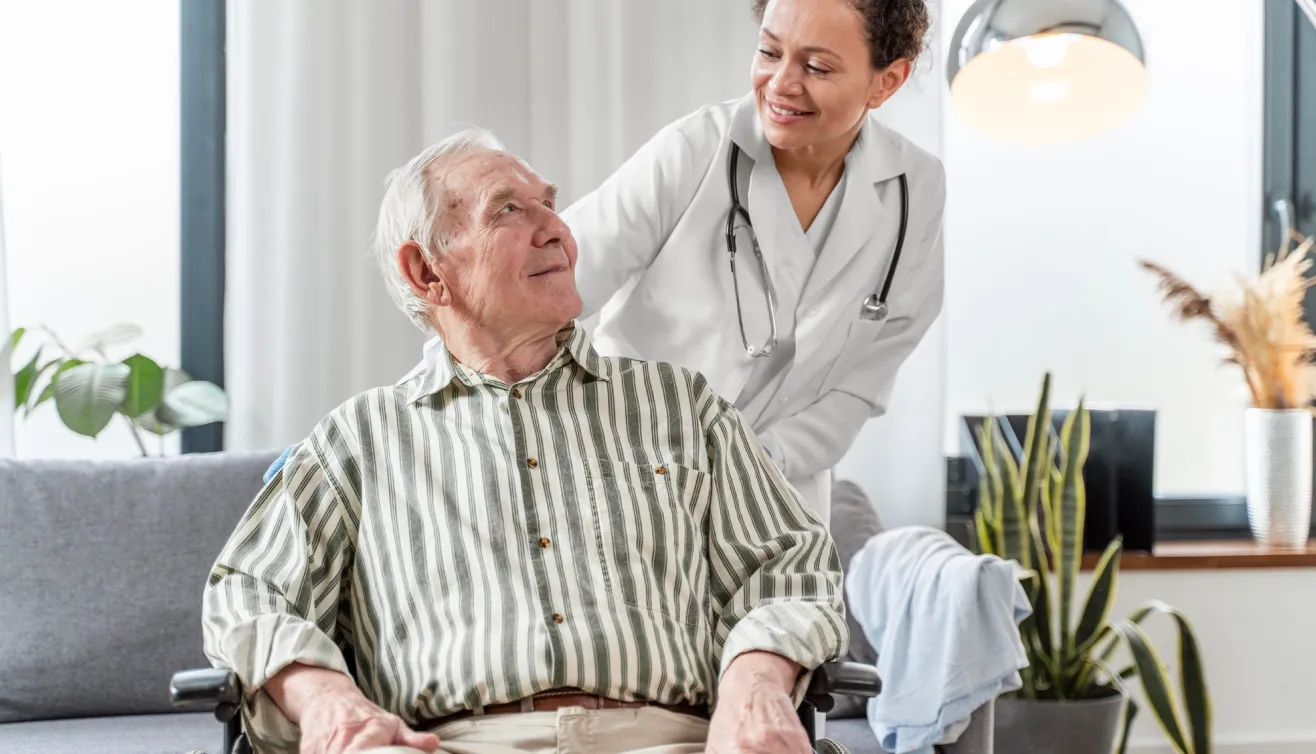 Care worker assisting a resident