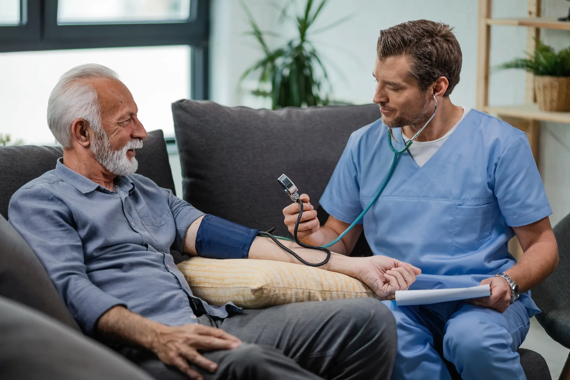 GP supporting a person at home