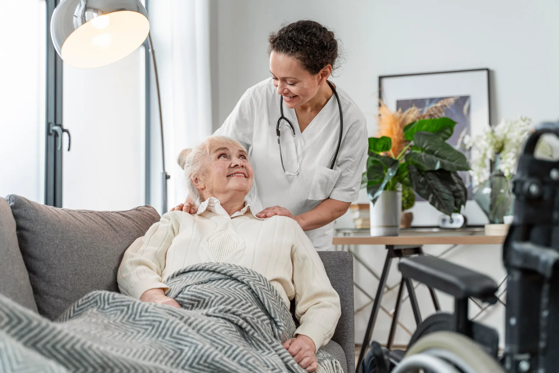 Care worker supporting a person at home